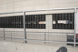 A head on shot of a bar grating system that is installed in a parking garage